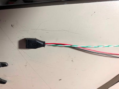 New HDD CableThis may be one of the trickiest steps. The Micro USB Extension cable will be cut and turned into two wires: One that is soldered to the Pi, and the other that connects to the hard drive.

This setup will allow us to unplug the Pi from the Hard drive and plug in another USB cable so that the drive can still be accessed from a PC. This makes updating content MUCH easier.

The male end should have about 1.5-2 inches of wire. This will connect to the Pi.

The female end will connect to the USB OTG adapter. If you can find a slimmer connector or cable that fits, please let me know in the comments.

I had to shorten the length of the OTG adapter slightly in order to make it fit. I bent the metal piece up using needlenose, then snipped off the excess plastic.

Step 7: Step 5: Make Your Power Cable
