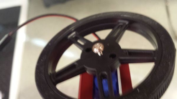 Attach wheel to DC Motor shaft with small screw